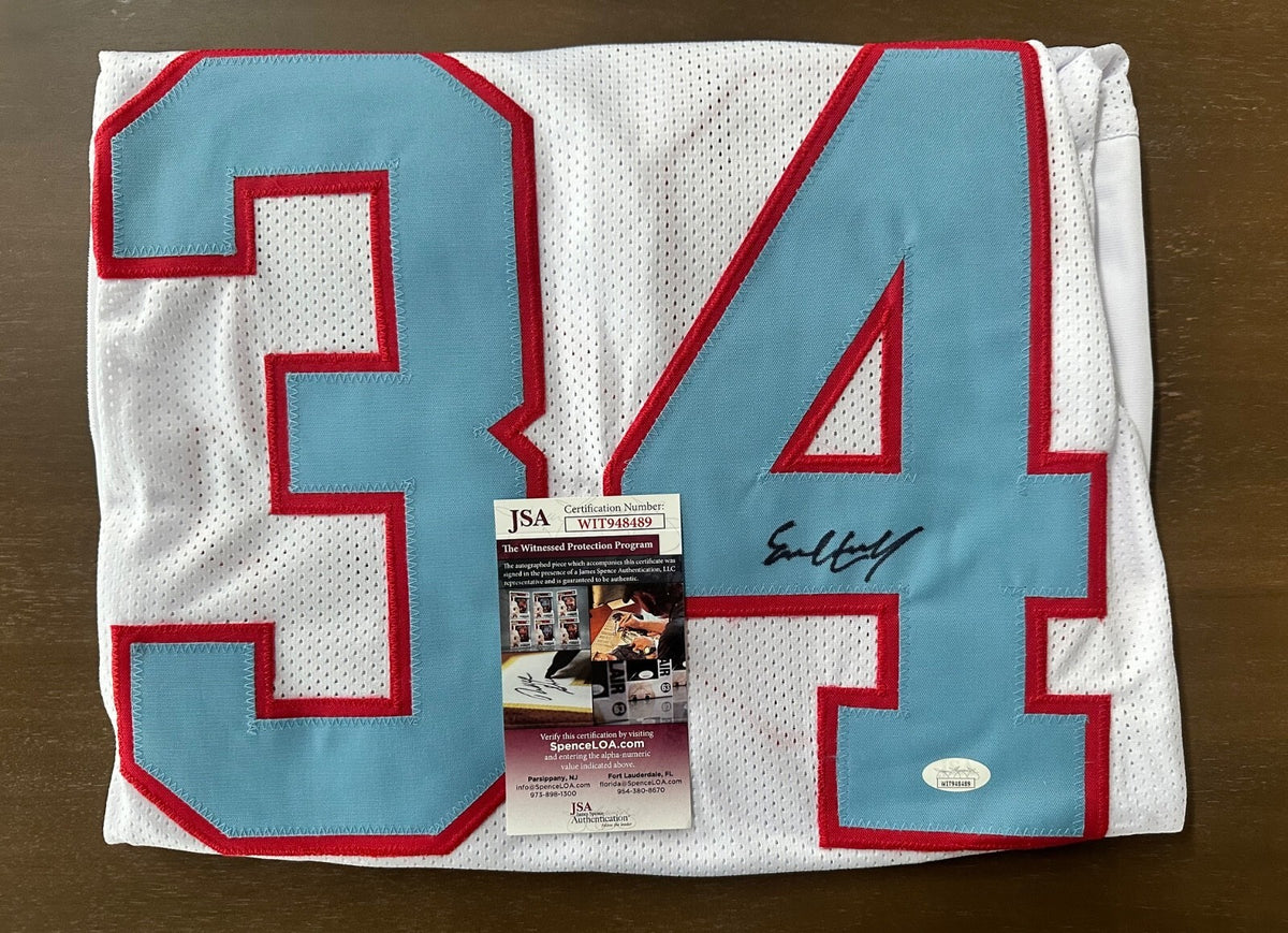 Autographed Earl Campbell Houston Oilers throwback jersey.
