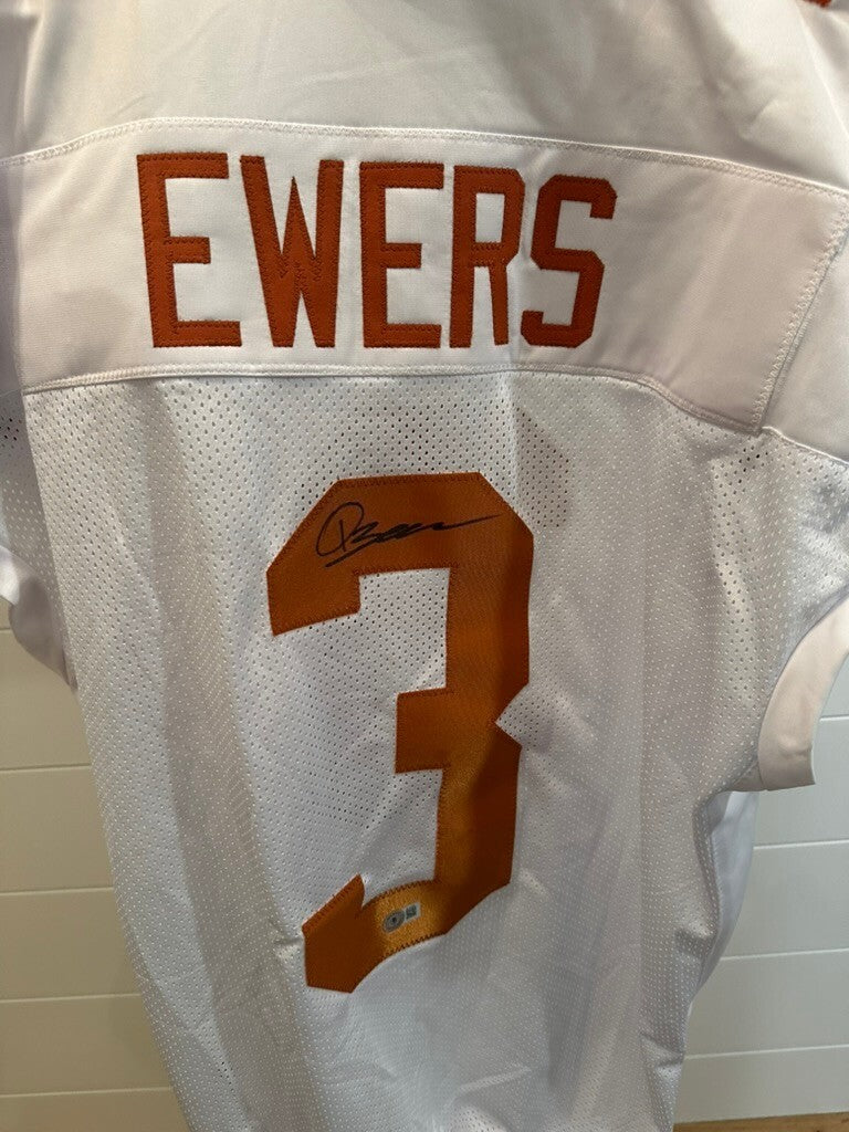 Quinn Ewers Signed Football Jersey with Beckett Authentication