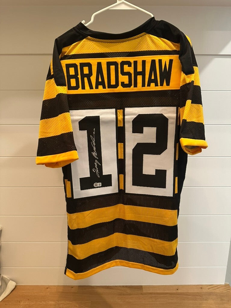 Terry Bradshaw Signed Yellow and Black Football Jersey Beckett Authenticated