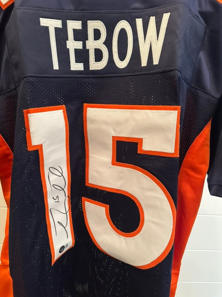 Tim Tebow Signed Denver Broncos #15 Blue Jersey Beckett BAS Witnessed