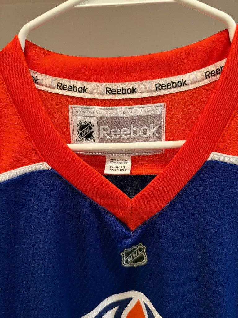 Taylor Hall Edmonton Oilers #4 Reebok Youth L/XL Blue Orange NHL Hockey Jersey