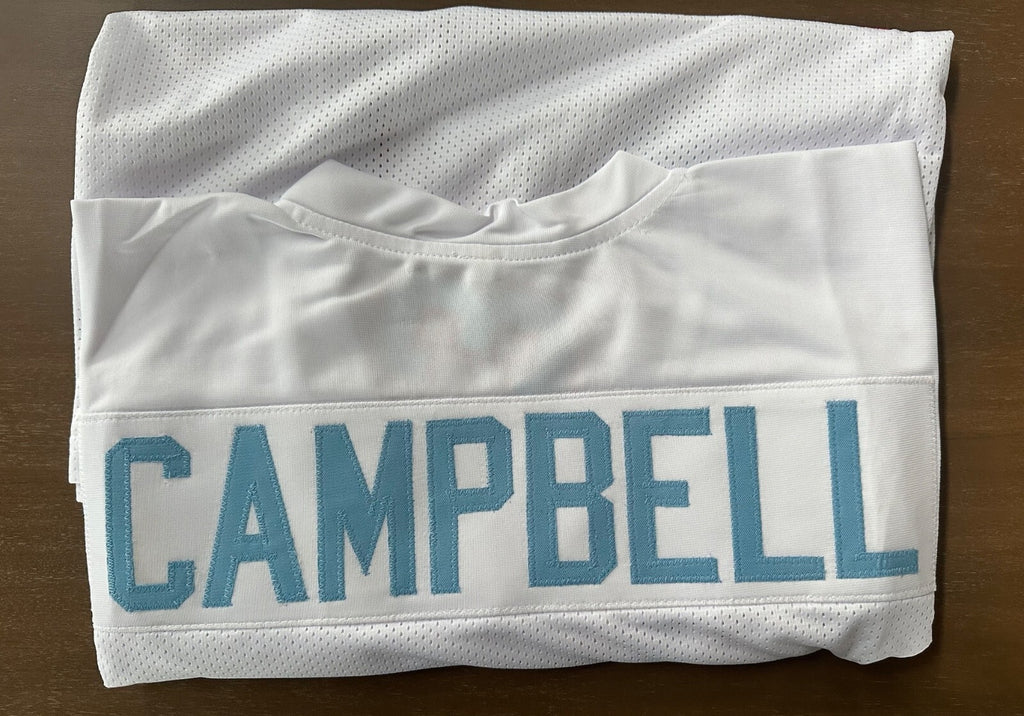 Autographed Earl Campbell Houston Oilers throwback jersey.