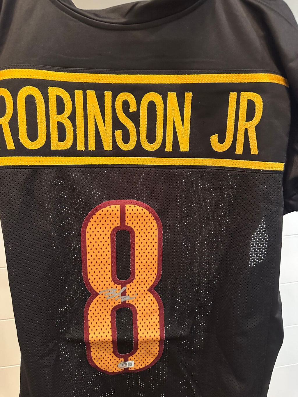 Brian Robinson Jr. Signed Washington #8 Jersey with game cut sleeves–